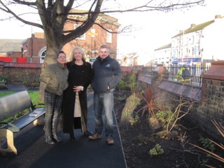 (L-R) Kelly Waring and Terri Kearney from Nightstop Communities North West replanted trees in St Paul’s peace garden with help from Merseylink’s Mark Welsby